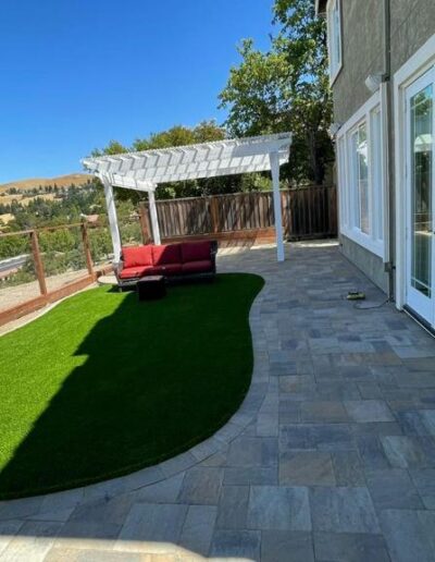 synthetic turf and pavers