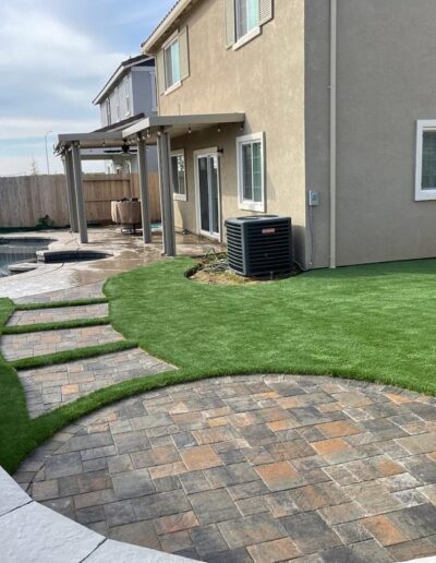 synthetic turf and pavers