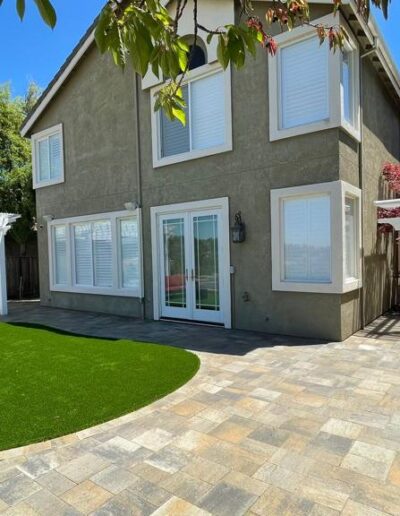 synthetic turf and pavers